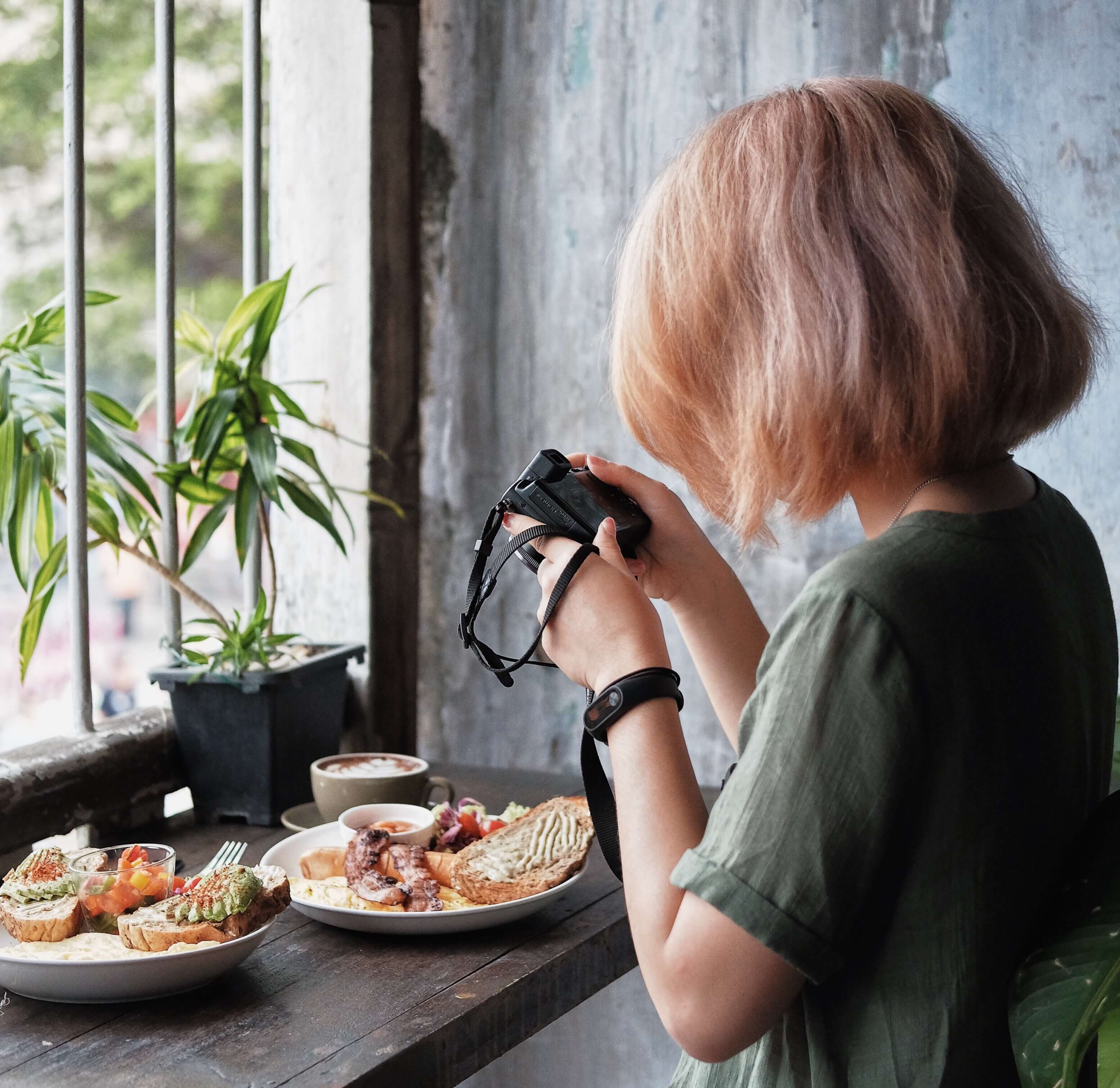 Food blogger at her laptop